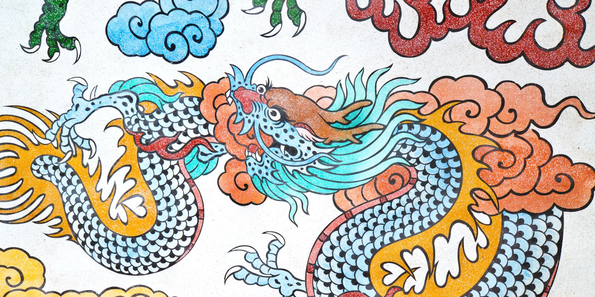 Ett kinesiskt mönster med färgglada drakar